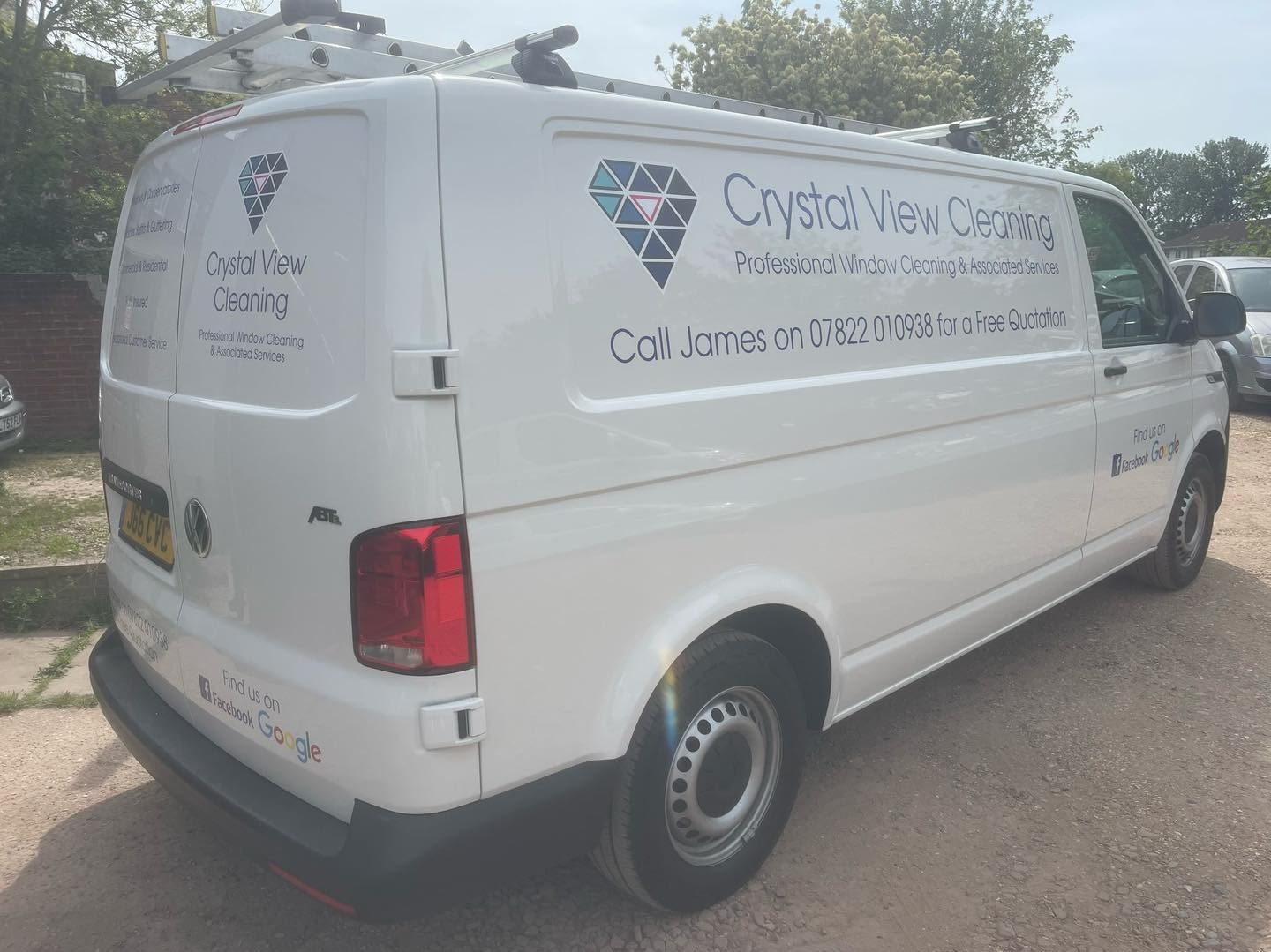 The Crystal View Cleaning van with its diamond logo and phone number